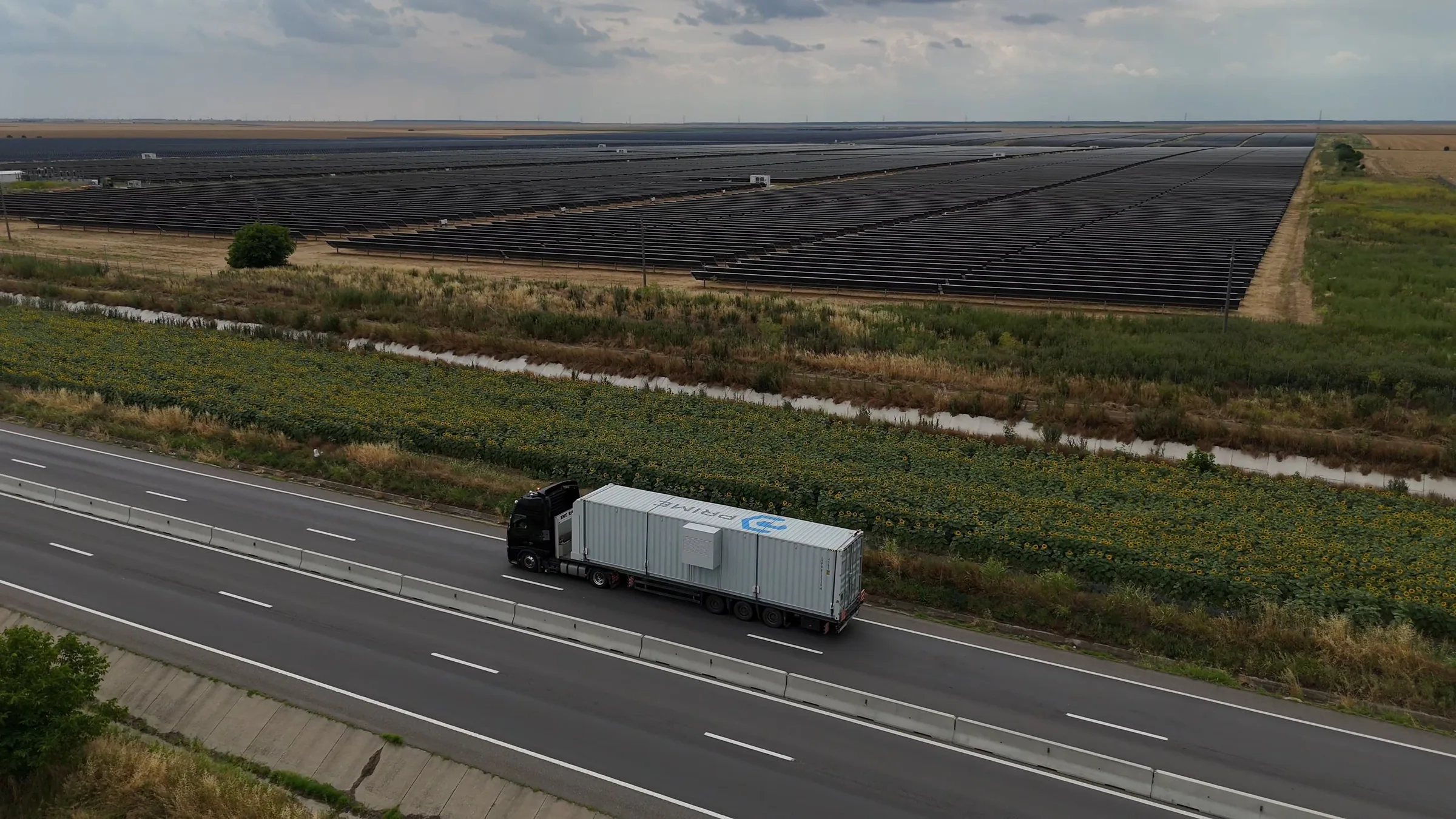 Utility-scale battery energy storage containers at a renewable energy site